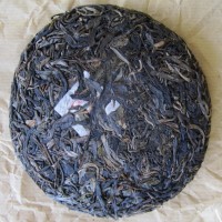 Galette de face - Puer Sheng YaNuo 250g [photo: Cream of Banna]